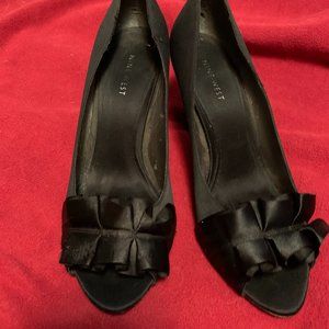 Nine West black satin peep toe pumps with bows
